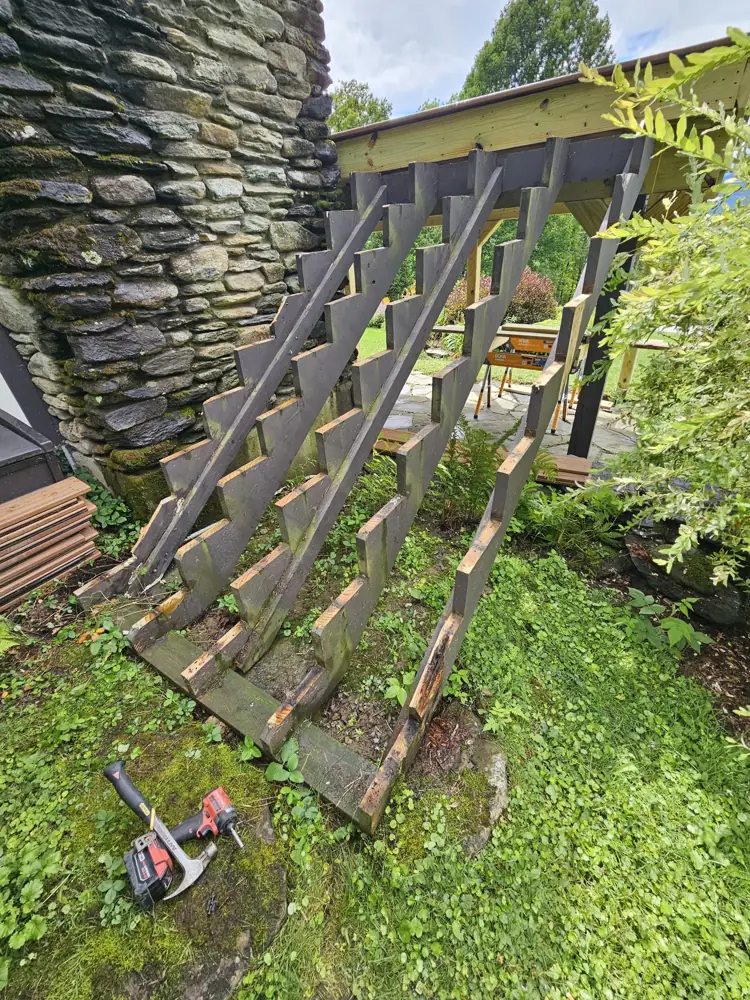 Old stair stringers coming out next to the stone chimney